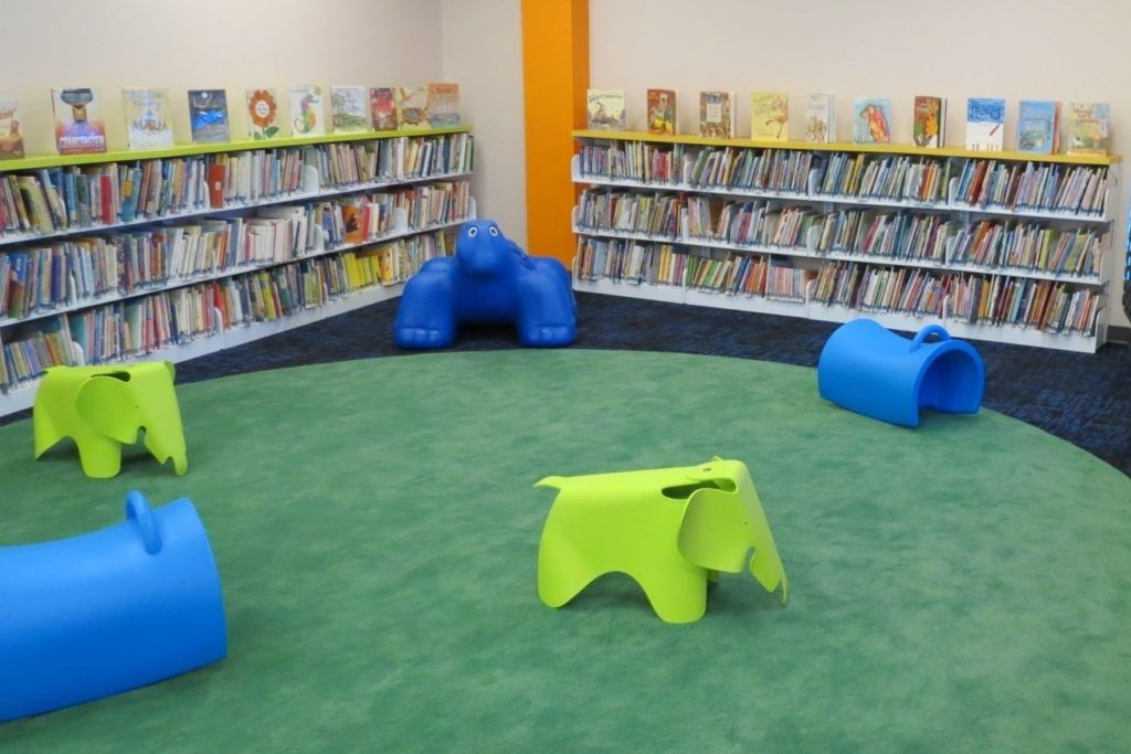 Indoor fall preventing carpeting at library children's room.